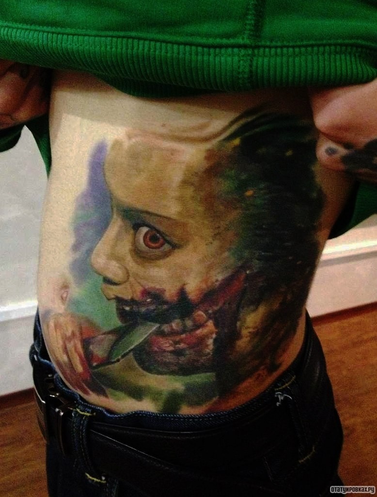 Фотография татуировки под названием «Лицо зомби»