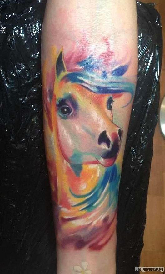 Фотография татуировки под названием «Конь, пегас»