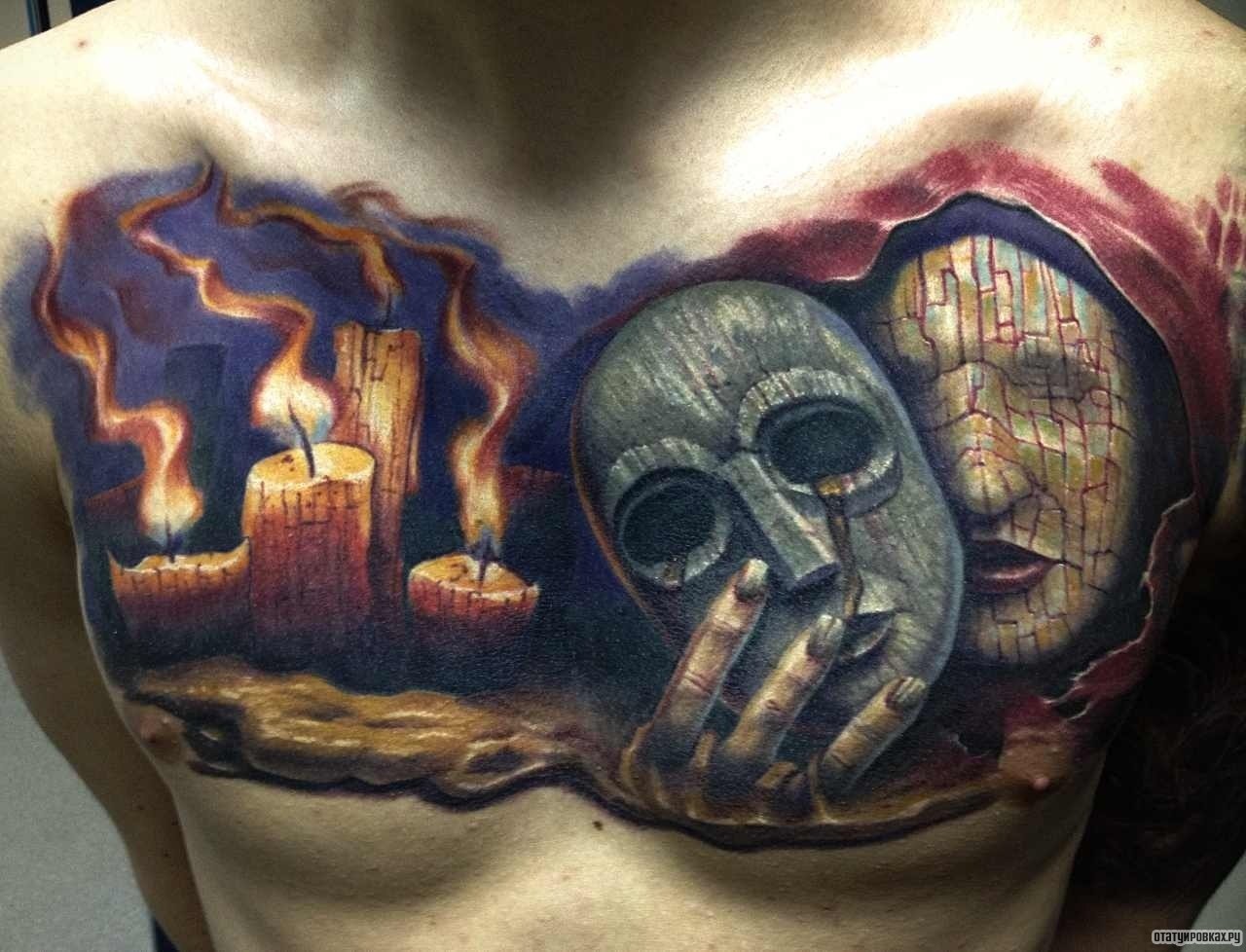 Фотография татуировки под названием «Свечи и маска»