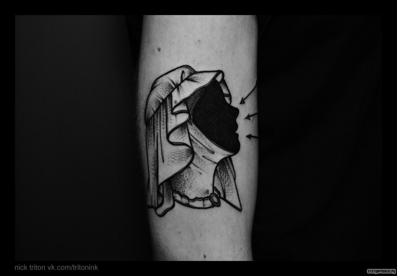 Фотография татуировки под названием «Черное лицо девушки»