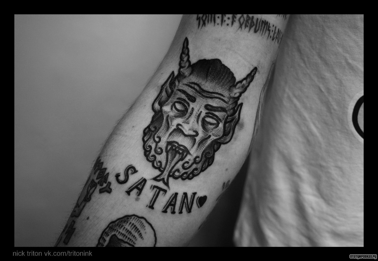 Фотография татуировки под названием «Морда черта»