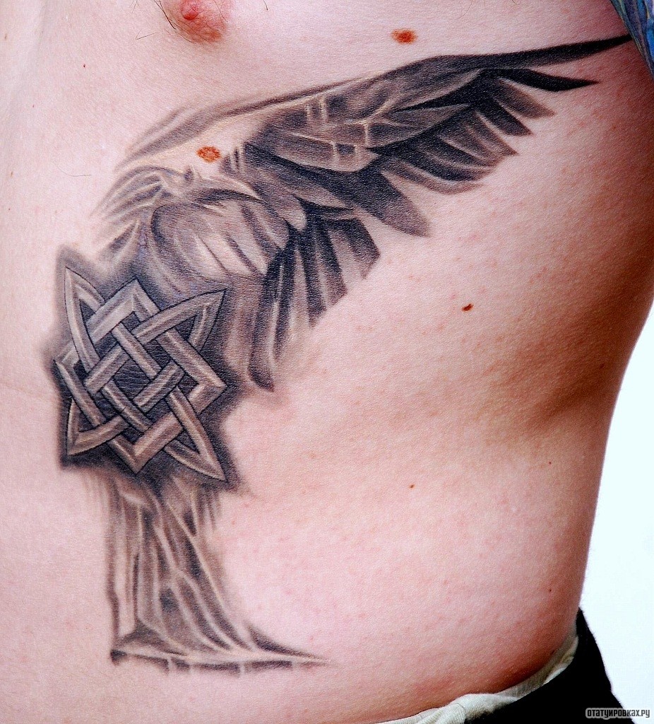 Фотография татуировки под названием «Узор в виде птицы»