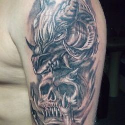 История татуировок лев дракон