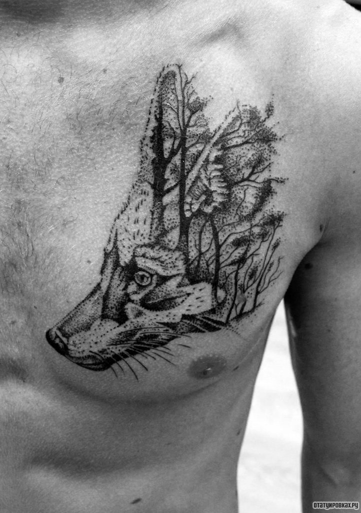 Фотография татуировки под названием «Морда волка с деревьями дотворк»