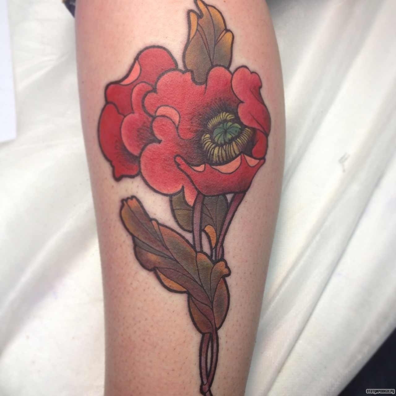 Фотография татуировки под названием «Цветок красный»