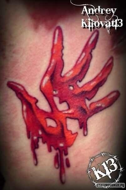 Фотография татуировки под названием «Очертание кровавой руки»