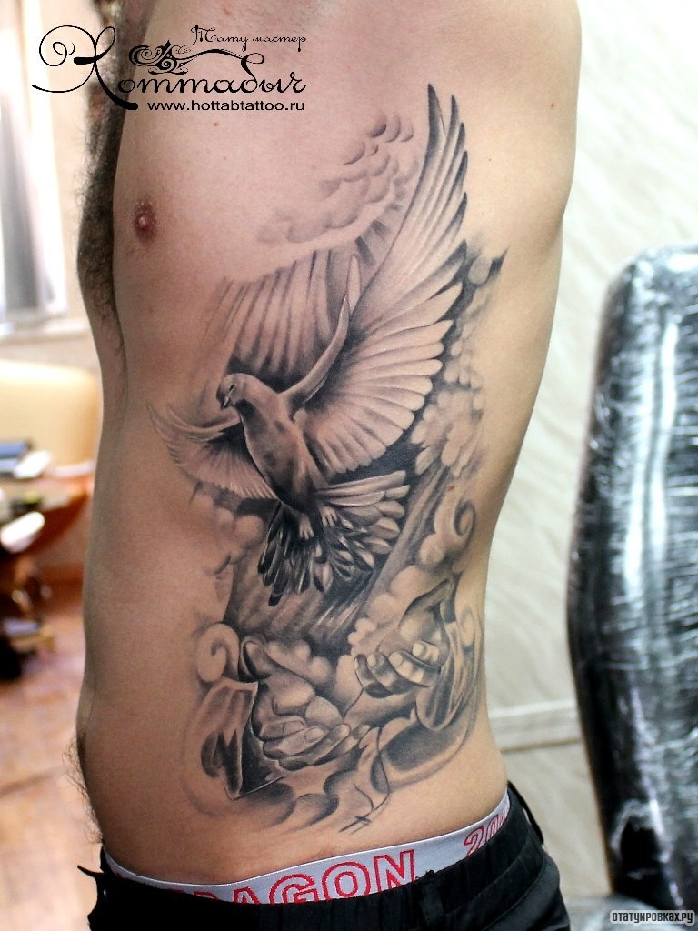 Фотография татуировки под названием «Вспорхнувший голубь»