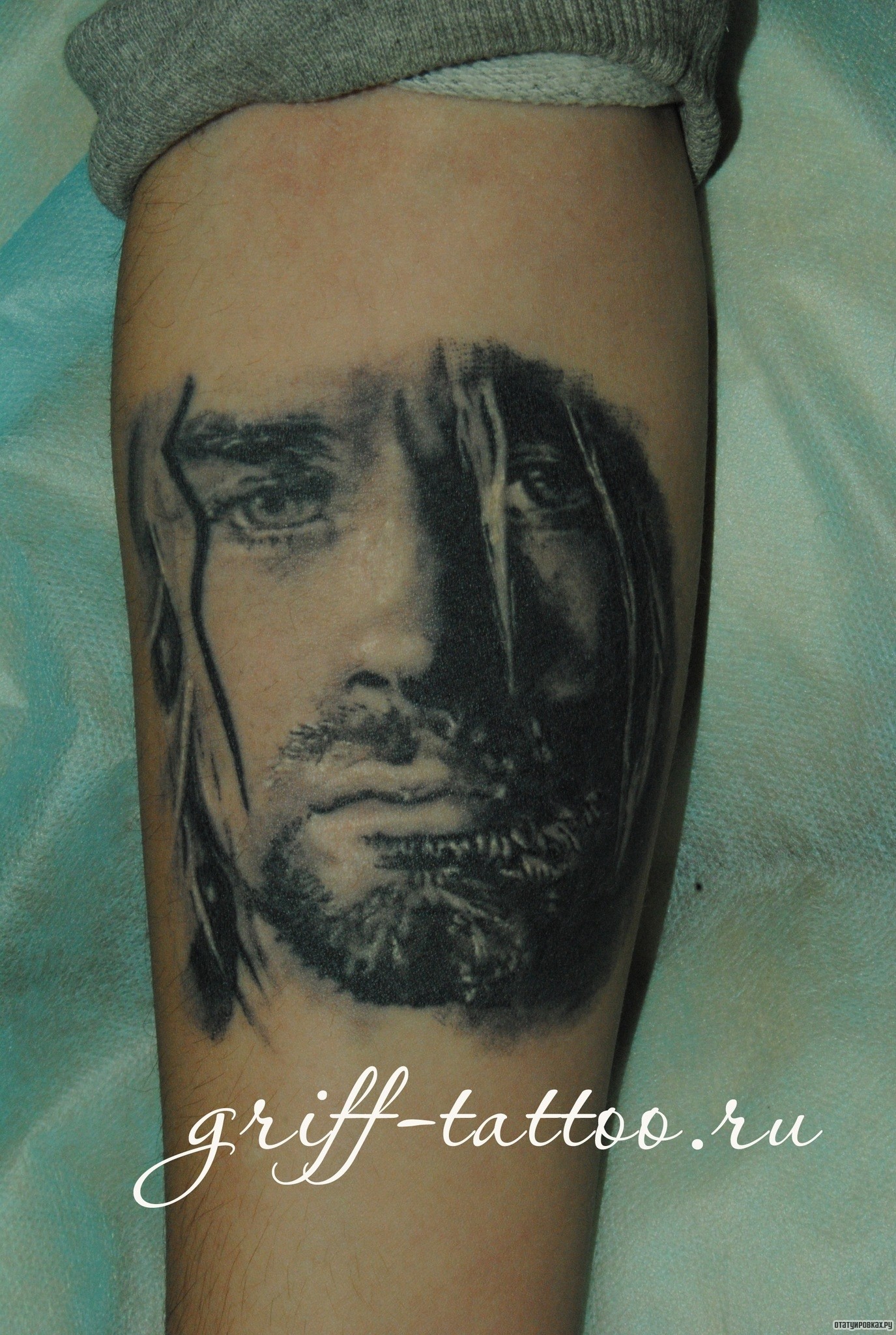 Фотография татуировки под названием «Лицо человека портрет»