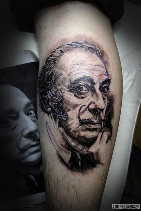 Фотография татуировки под названием «Человек с усами»