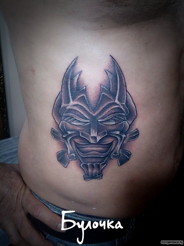 Фотография татуировки под названием «Маска»