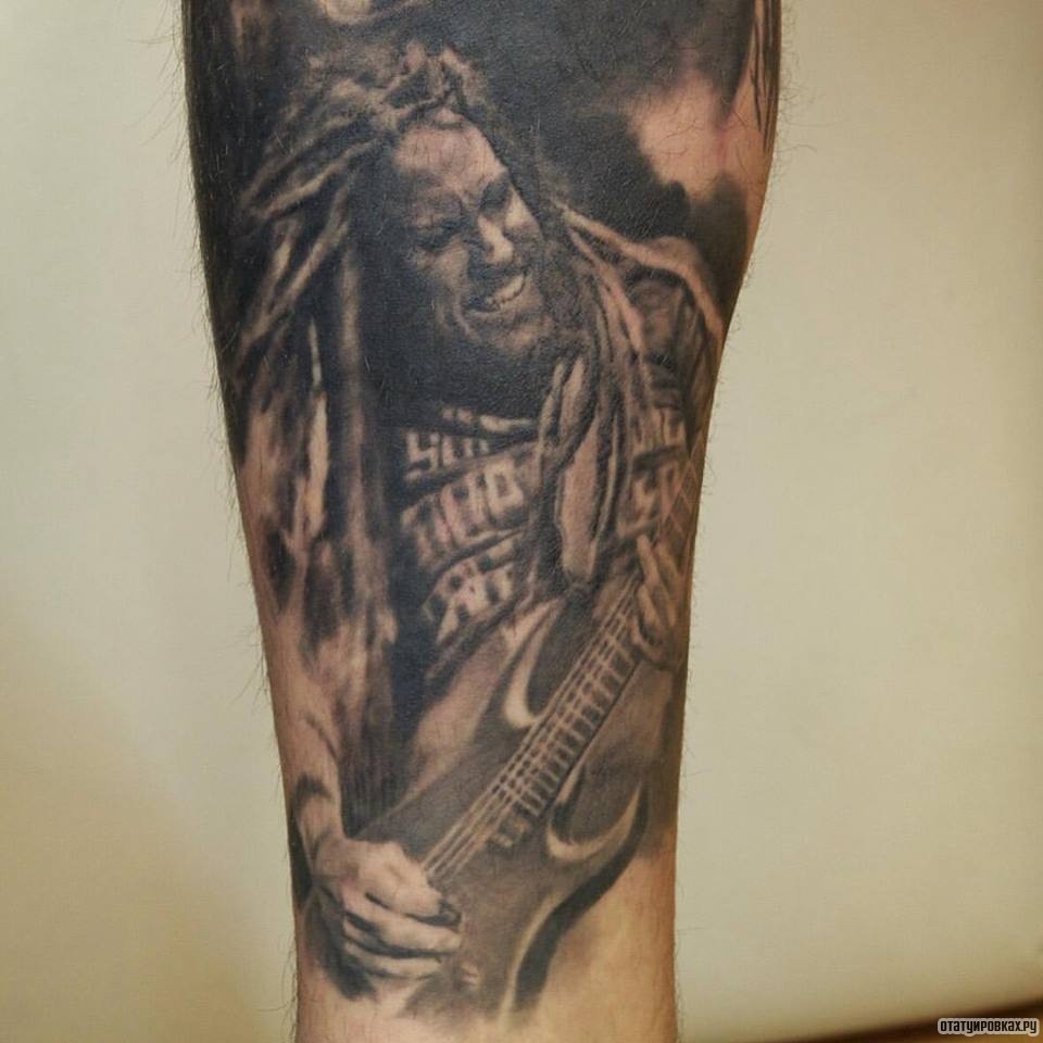 Фотография татуировки под названием «Гитарист рок»