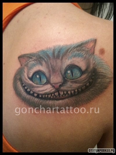 Фотография татуировки под названием «Чеширский кот»