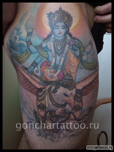 Фотография татуировки под названием «Ганеша и орел»