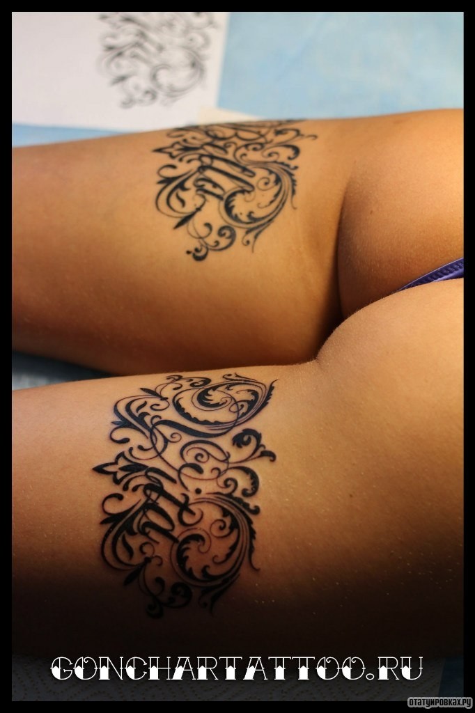 Фотография татуировки под названием «Узор с надписью»