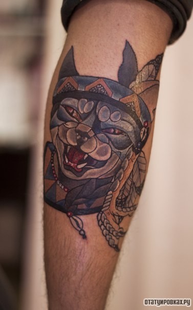 Фотография татуировки под названием «Синий кот на голени»
