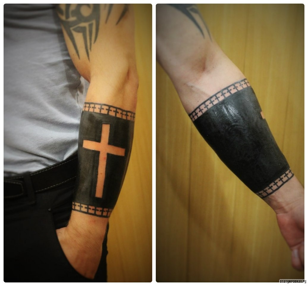 Фотография татуировки под названием «Крест блек ворк на предплечье»